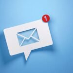 White speech bubble with envelope icon on a blue background; red circular notification badge with the number 1 at the top-right.