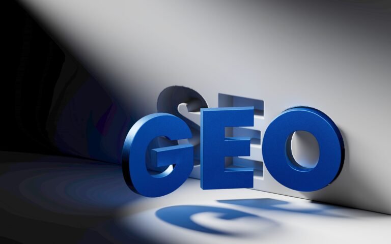 Blue 3D GEO letters arranged in a bold, angled row against a pale gradient background with strong shadows.